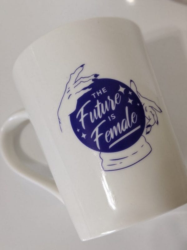the future is female white 14oz mug front