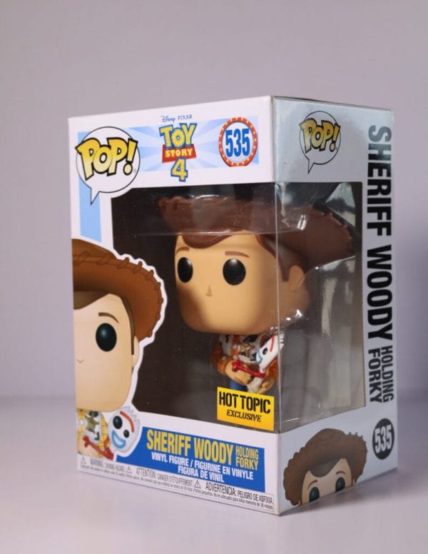 holding forky sheriff woody funko pop!